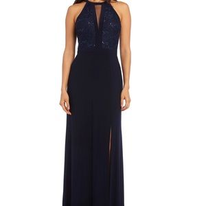 Black gown w/ lace back & leg slit.